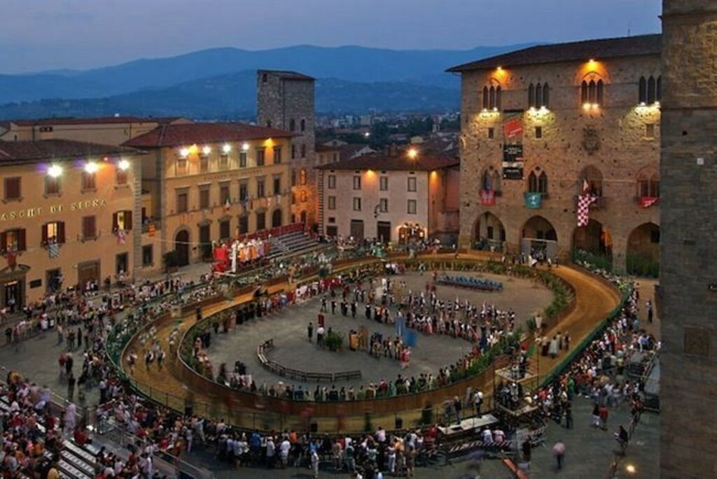 Historic Giostra dell'Orso horse tournament in Piazza del Duomo, Pistoia, during the celebrations of Saint James.