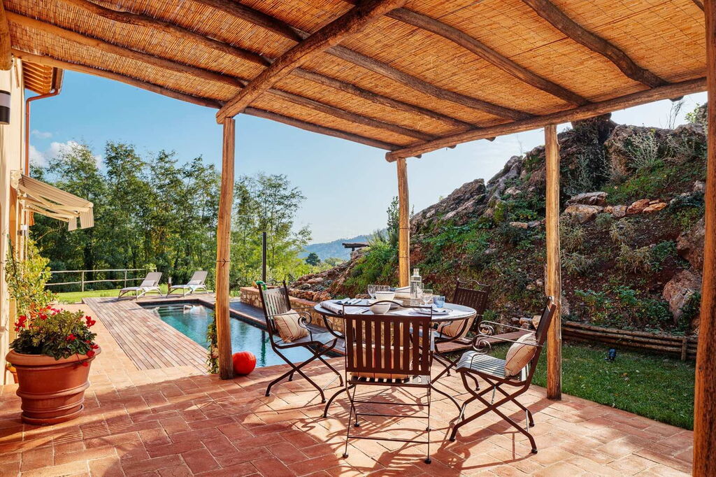 Tuscan villa with private pool and terrace under a pergola